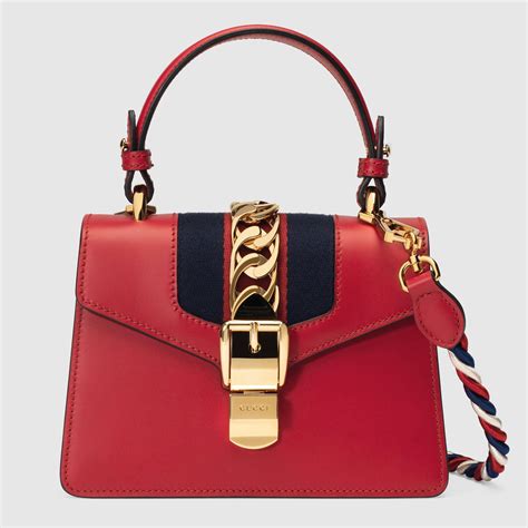 gucci red yellow cream brown block purse|brand new red Gucci purse.